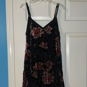 Women’s American eagle black dress with velvet flowers.